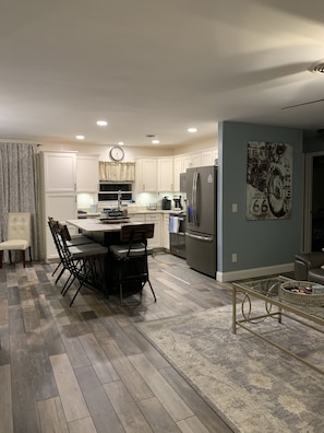 Open floor plan, living room, kitchen and dining.