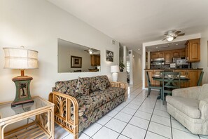 Living room, dining area, and kitchen share an open layout.