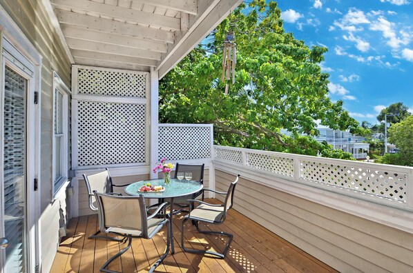 Enjoy alfresco meals on the sunny porch.