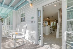 Balcony off the kitchen. Large doors let in fresh air.