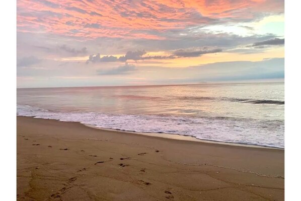 Sunrise over the Atlantic Ocean where dolphins greet you nearly every morning 