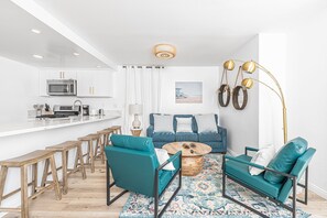 Newly renovated with style & comfort in mind, this downstairs beach home will sweep you off your feet and into vacation mode!
                