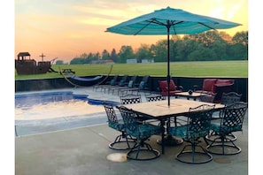 Enjoy morning coffee by the pool while watching the sunrise.