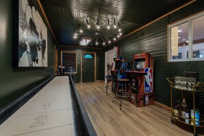 Arcade/Game Room with Shuffleboard and Arcade Games 