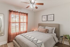 Bedroom 2 has a queen-sized bed.