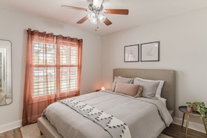 Bedroom 2 has a queen-sized bed.