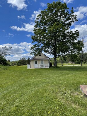 Side porch for relaxing and sipping wine or a cold beer
