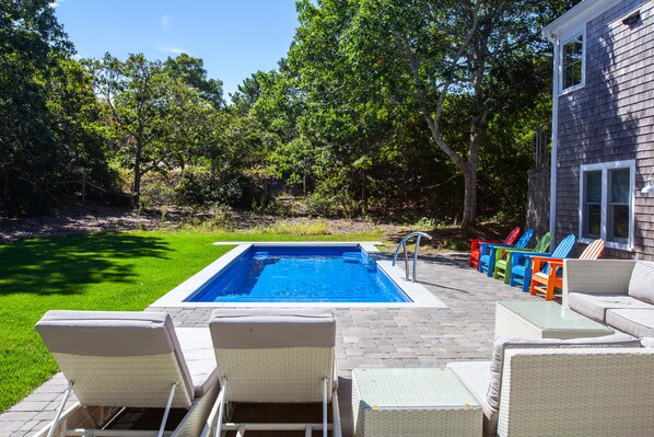 Large fenced backyard with saltwater pool, outdoor furniture 