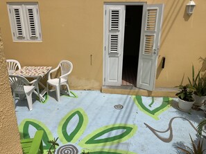 Entrance to living/kitchen from outside terrace.