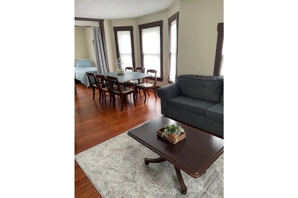 Living room, dining area, and second bedroom.