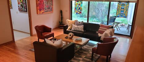 Living Room with Original Art and Huge Book Collection