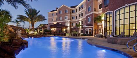 Take in gorgeous views while lounging around the on-site outdoor pool.