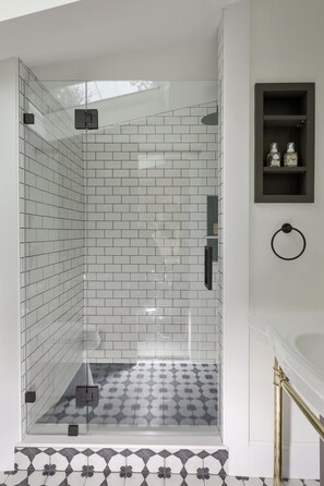 Sparkling luxurious bathroom with walk-in shower for you. 