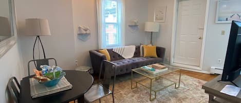 Living room, Dining Table (comes equipped with snacks and water upon move-in)