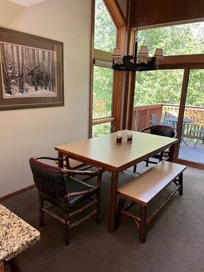 Dining table looking at the deck from the kitchen