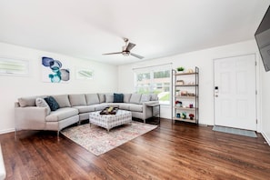 Main level living area with tv