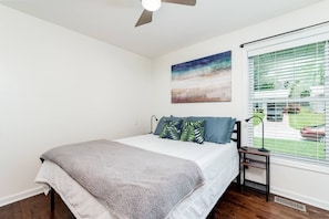 Bedroom 1 with queen bed and Roku tv