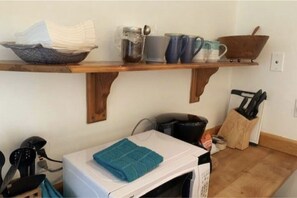 Fully equipped kitchen with all the essentials you need for a comfortable stay. 