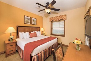 Primary bedroom features a king bed