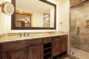 Primary Bathroom features a dual vanity and large oversized shower..