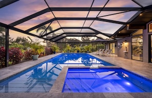 Swim, float, or soak up the sun—this expansive 40ft saltwater pool redefines backyard luxury