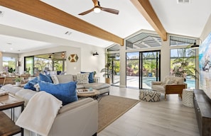 Open, airy, and inviting—your spacious living area merges seamlessly with the outdoors