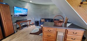 Portable kitchen island, living room and smart TV. Direct TV included.