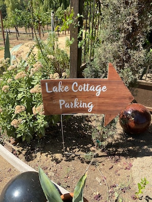 Signage for Lake Cottage parking.