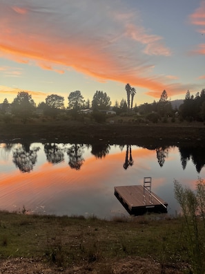 Sunset & lake view from lawn below back deck