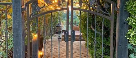 Wrought iron gate entrance to Lake Cottage.