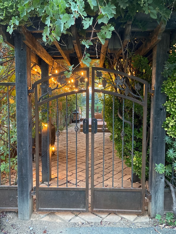 Wrought iron gate entrance to Lake Cottage.