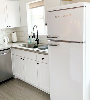Completely renovated kitchen! Fully equipped & ready for your home cooked meal.