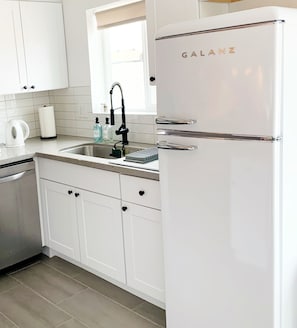 Completely renovated kitchen! Fully equipped & ready for your home cooked meal.
