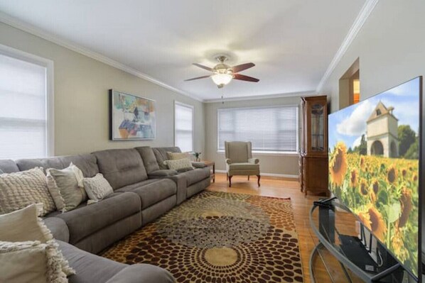 Roku tv and oversized couch in the living room!