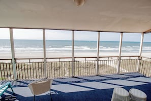 You'll be able to enjoy the sea breeze and wavey views with the whole group on this wide balcony.