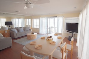 A cozy living room with 180 degree views of the ocean!