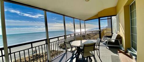[Balcony] Large balcony with outdoor dining & lounge area. Ocean Views for miles and miles!