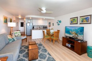Open concept living room and kitchen, fresh and updated.