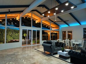 String lights, tiki torches, fire pit, grove light outside, LED and mood lighting inside