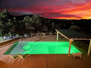 Enjoy sunsets by or from the pool (with a color changing pool light)