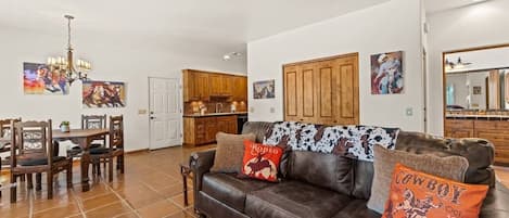 Dining and living area with full kitchen