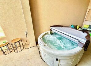 New for 2023! 5 seater hot tub to relax in.