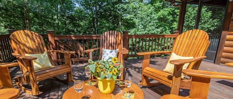 Whether sitting in the shade or sunning yourself, enjoy the large deck. 
