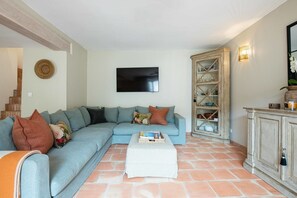 Very large seating area with doors directly onto the outside terrace.