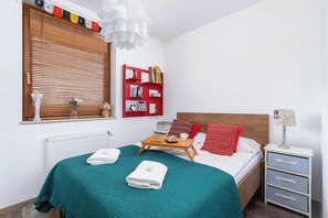 Bedroom with a comfortable double bed.