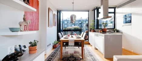 Dining and Kitchen Area looking out over south facing terrace 