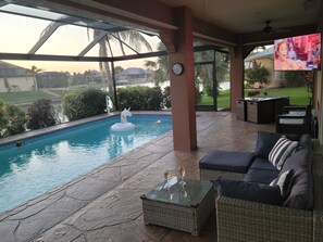 Watch Sunsets and TV from the pool!