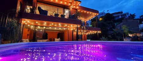 Villa at night. Top left: Ivan's Bella Vista, Bottom left: Curiel's Retreat