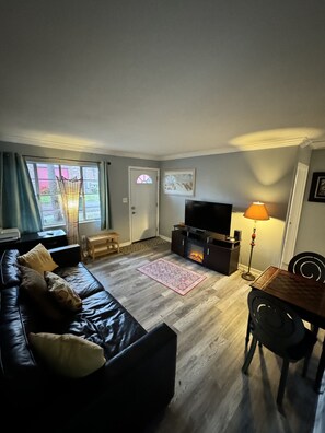 Furniture, Indoors, Living Room, Couch, Lamp
