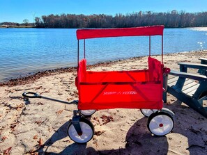 120 Foot Private Beach! You will love the 160+ feet of lakefront shoreline with a gently sloped naturally sandy lake bottom, and warm freshwater.